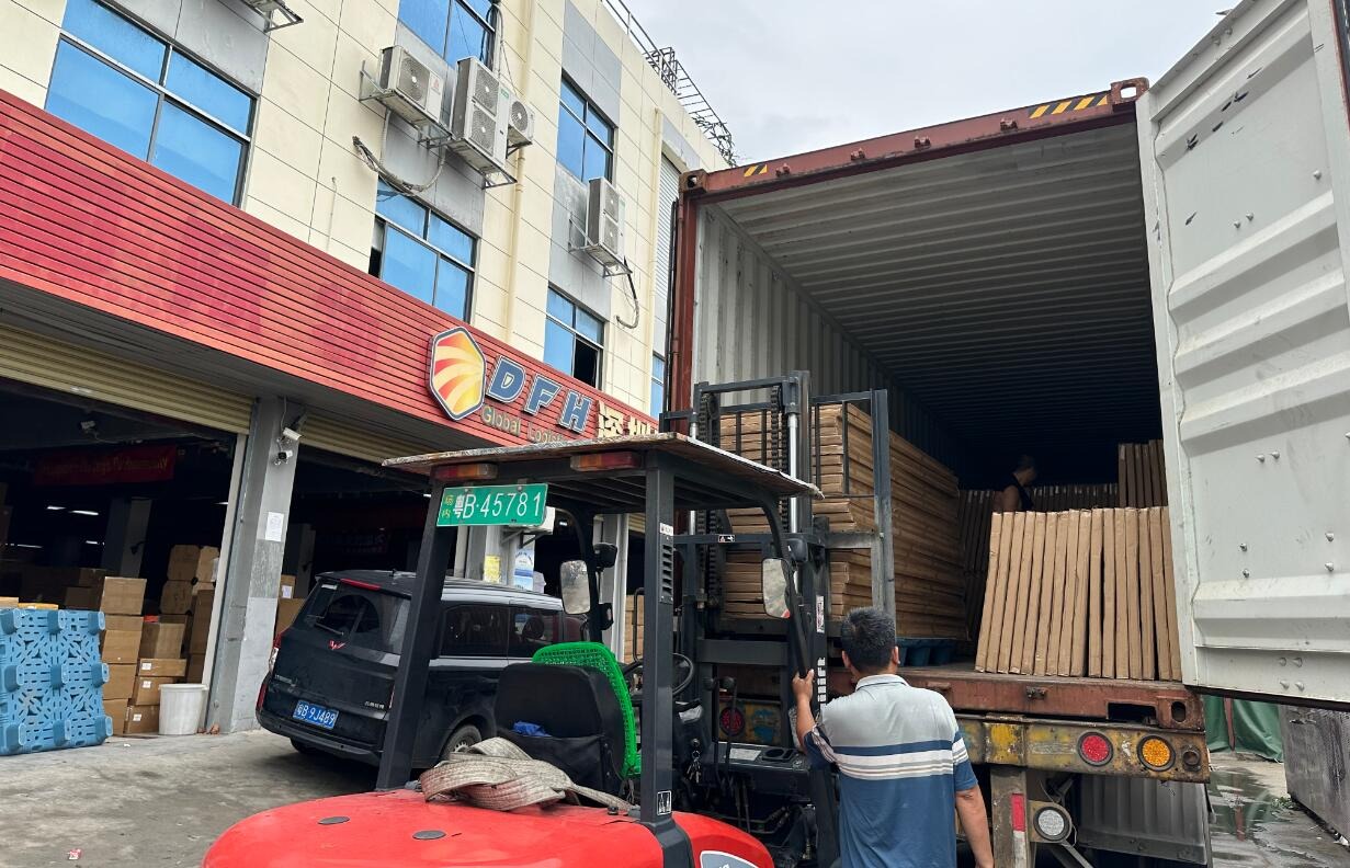Loading a container at our warehouse